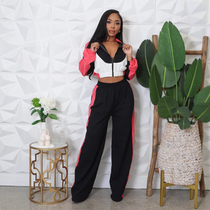 Ensemble de vêtements de sport pour femmes à motif uni, coupe régulière, décontracté, respirant, veste courte à genoux, pantalon large à taille haute - Product Image 1