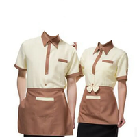 Uniforme de personnel d'hôtel de haute qualité en mélange polyester/coton avec poches avant, tailles et couleurs personnalisées, unisexe, logo personnalisé