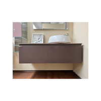 Meuble-lavabo mural moderne de marque italienne, finition marron chocolat mat, avec dessus en porcelaine aspect pierre, tiroir spacieux, prêt à l'emploi avec robinetterie de salle de bain