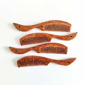 Tendance du moment : Peigne en bois de coco du Vietnam, peignes à cheveux en coco faits à la main, prise en charge par FBA, prêt à l'exportation - Product Image 1