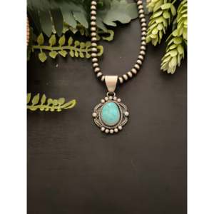 Pendentif Mathilda Benally Royston en turquoise et argent sterling avec technologie d'incrustation à sertissage clos - Product Image 1