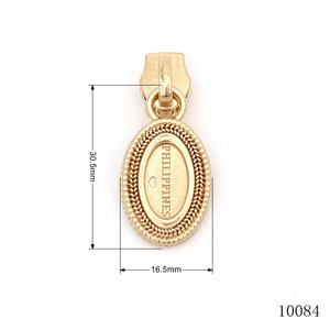 Fournisseur de quincaillerie pour sacs en cuir de haute qualité, tirette métallique ronde et ovale personnalisée avec logo gravé et embossé, avec <span class=keywords><strong>curseur</strong></span> - Product Image 2