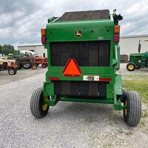 Compre 2023 Tractor empacador de heno redondo John Deer bastante usado Compre máquina empacadora de heno redondo disponible a bajo precio Compre tractor empacadora de heno - Product Image 1