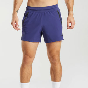 Pantalones cortos deportivos para hombre hechos de poliéster 100% con tela transpirable y de secado rápido diseñada para el verano - Product Image 4