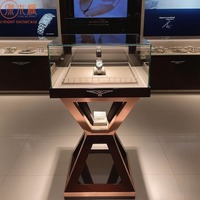 Tables d'exposition de montres modernes avec éclairage LED, vitrines de luxe pour bijoux et montres, fabrication sur mesure par le fabricant source.