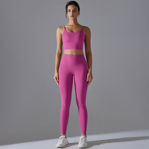 Venta al por mayor de logotipo personalizado sin costuras sólido elástico Yoga conjunto sujetador Legging correr de dos piezas gimnasio Fitness conjuntos ropa para mujer - Product Image 2