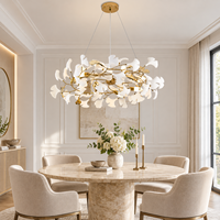 Lustre moderne en forme de feuille de ginkgo dorée, luminaire suspendu en verre blanc pour salon, chambre et salle à manger, décoration de luxe.