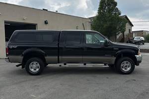 FORD F-250 SUPER DUTY LARIAT CREW CAB 4X4 2002 D'OCCASION CÔTÉ GAUCHE/DROIT - Product Image 4