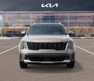 Kia Sorento Hybride EX AWD 2025 d'occasion, faible kilométrage, marron, avec toit ouvrant panoramique, démarrage à distance, navigation, sièges en cuir, jantes en alliage - Product Image 1