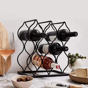 Casier à vin en métal noir avec un design minimaliste et ondulé, tenant plusieurs bouteilles horizontalement, disponible au prix de gros. - Product Image 6