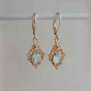 ต่างหูเงินแท้ 925 ชุบทอง 14k ประดับพลอยอะความารีน รับรองโดย IGI สีฟ้าอ่อน ดีไซน์วินเทจ ลายฉลุ สำหรับงานปาร์ตี้ - Product Image 4