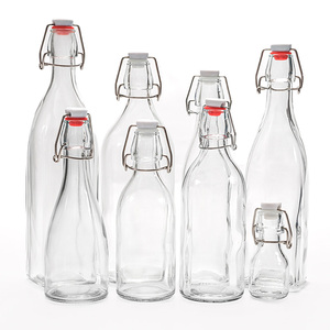 Botellas de Vidrio Transparentes con Tapa Abatible Personalizadas de 250 ml, 500 ml, 750 ml, 1000 ml, Botella de Vidrio para Bebidas, Vodka, <span class=keywords><strong>Whisky</strong></span> con Tapa Abatible Fácil de Abrir - Product Image 1