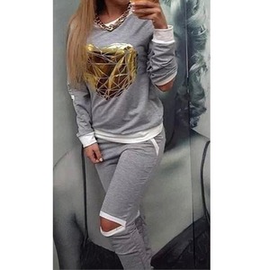 Pro Custom Logo Ropa de calle de moda para mujer Chándal de talla grande a prueba de viento con estampado dorado de Ayat Export para la temporada de invierno - Product Image 1