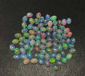 Cabochon ovale multi-feu en opale éthiopienne naturelle certifiée IGI 22 pièces 5*7MM 10 CT Lot de pierres précieuses en vrac pour bijoux - Product Image 3