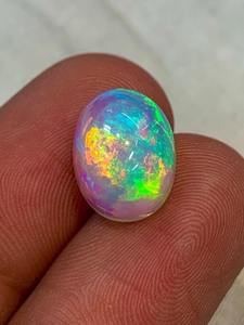 Vente en gros cabochon opale éthiopienne de qualité supérieure blanc naturel 11x9mm pierre précieuse ovale en vrac faite à la main - Product Image 5