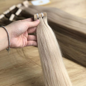 Venta al por mayor 24 pulgadas Rubio Extensiones de cinta 100% Natural Humano Remy Cabello Teñido Liso Virgen Cabello Crudo Procesado Químicamente - Product Image 1