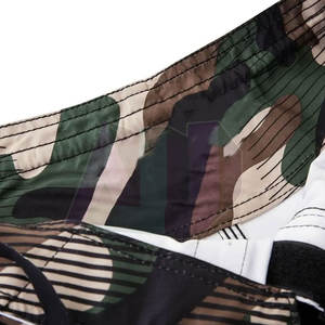 Pantalones Cortos Profesionales de MMA para Entrenamiento Activo - Elásticos, Transpirables, Ligeros y Duraderos - Product Image 5