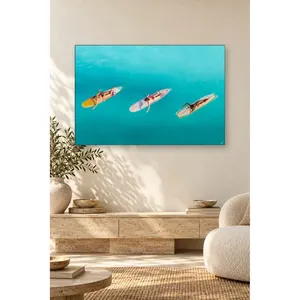 Impression sur toile Fida Turquoise Sea : Trois femmes sur des planches de surf - Product Image 2
