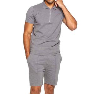 Conjunto de algodón cómodo de verano para hombre-Polo con logotipo transpirable y pantalones cortos cargo con cordón liso de secado rápido estilo deportivo al por mayor - Product Image 1