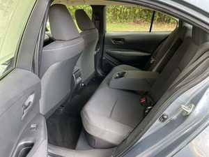 Hybrid LE FWD 4 portes 2024 d'occasion, état impeccable, sièges en tissu, moteur hybride, transmission automatique, Bluetooth, conduite à gauche, couleur foncée - Product Image 5