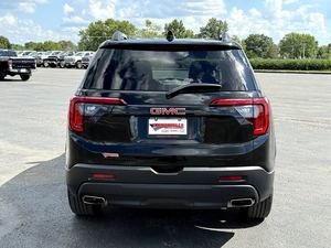 Último negro 2024 GMC Acadia SLE AWD usado con llantas de aleación Asientos de cuero Sistema de navegación Arranque remoto Android Auto Sunroof - Product Image 4