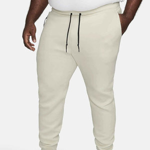 Pantalones deportivos transpirables de tejido tecnológico para hombre con ajuste informal, cintura elástica y diseño funcional para el trabajo, el hogar o viajes, que brindan comodidad. - Product Image 1