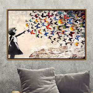 Impression d'art graffiti Fille avec papillons : Œuvre d'art urbaine vibrante sur toile, TOILE ENCADRÉE DORÉE - Product Image 1