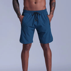 บริการผลิตเสื้อบาสเก็ตบอลแบบใหม่ปี 2025 พร้อมโลโก้สั่งทำพิเศษ ผ้าตาข่าย ทรงสตรีท ความยาว 5 นิ้ว ผลิตด้วยเทคนิคซับลิเมชั่น โพลีเอสเตอร์ เอวยางยืดปานกลาง บริการ OEM - Product Image 4