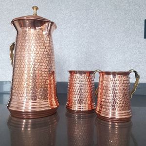 Premium handcrafted <b>copper</b> <b>jug</b> designed with aesthetic patterns enhancing home decor and dining experience - Product Image 1