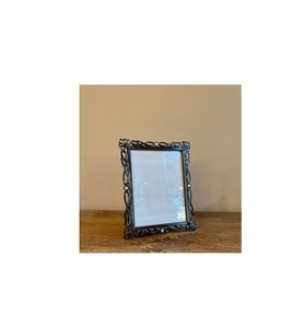 Premium decorative metal <b>photo</b> frame crafted <b>for</b> showcasing family portraits inside bedroom office or cozy home environment - Product Image 6