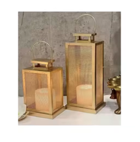 Lanterne à bougie suspendue en métal de designer, tendance du moment, faite à la main, écologique, sans flamme, finition accrocheuse, décoration d'intérieur