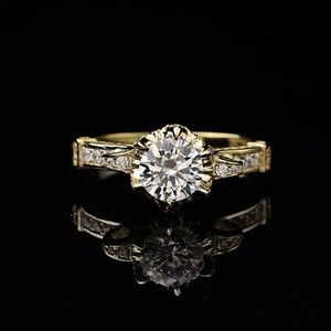 Bague de fiançailles solitaire taille ronde avec accents pour femme en or jaune ou or rose, style mignon - Product Image 1