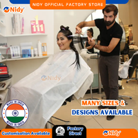 Tablier jetable unisexe Nidy pour salon, imperméable, résistant à l'huile, protection cutanée, non tissé, logo personnalisé, soins de beauté à domicile, soins personnels