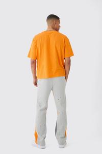 กางเกงวอร์มทรงหลวมสำหรับผู้ชายกางเกงวอร์มเอวกลางลายกราฟฟิตีสีสาดน้ำออกแบบโลโก้ได้ตามต้องการ - Product Image 2