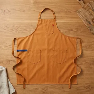 Tablier classique en toile marron robuste et réutilisable avec plusieurs poches et lien de fixation réglable pour le nettoyage - Product Image 1