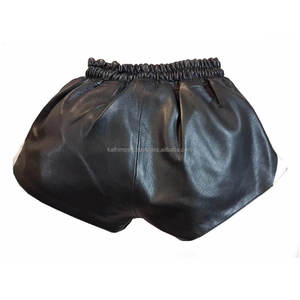 Short de combat en cuir noir personnalisé OEM taille élastique bandes latérales blanches pour la boxe MMA Kickboxing Gym et Fitness - Product Image 2