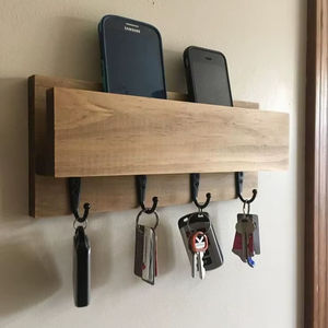 Simple wood <b>wall</b> rack designed to hold phones and <b>keys</b> in one spot. Available at wholesale prices. - Product Image 1