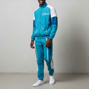 2026 Producto de tendencia Chándales de nailon Diseño de retales personalizado Conjunto de 2 piezas para hombres Venta al por mayor Poliéster Trajes de chándal personalizados - Product Image 1