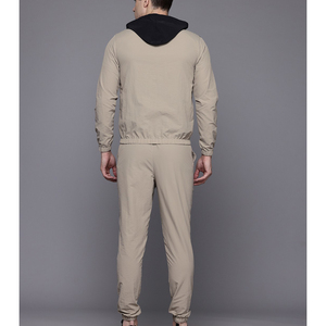 ชุดวอร์มสองชิ้นสำหรับยิมชุดวอร์มลายแถบด้านข้างของผู้ชายชุดวอร์มพิมพ์ลายโลโก้พัฟตามสั่ง - Product Image 3