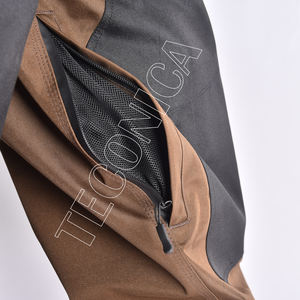 Pantalones de nieve impermeables marrones y negros con diseño de dos tonos Forro cálido de lana Cintura elástica y dobladillo ceñido para mayor comodidad - Product Image 6