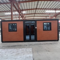 Maison de conteneur extensible de 20/40 pieds pour le logement des travailleurs Panneau sandwich respirant pour immeuble de bureaux pliant modulaire pour