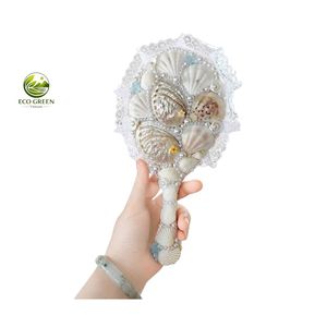 กระจกมือถือเปลือกหอยธรรมชาติทำมือแบบขายส่ง ขนาดพกพา 3x  ตกแต่งมุก  ผิวสัมผัสสีบรอนซ์  สำหรับแต่งหน้า  สไตล์ชายทะเล  เป็นมิตรกับสิ่งแวดล้อม - Product Image 3