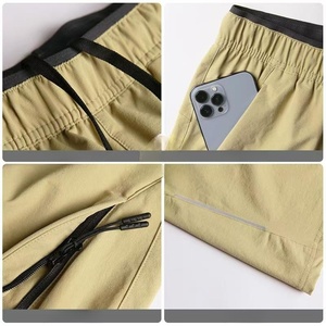 Short à taille élastique pour homme Short décontracté demi-longueur avec poche invisible à fermeture éclair pour homme Short de sport en nylon et élasthanne de bonne qualité - Product Image 4
