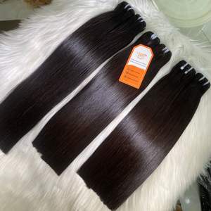Extensiones de cabello de trama recta de hueso vietnamita humano crudo 100% Color negro Natural cutícula virgen alineada - Product Image 1
