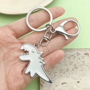 Hot bán Keychain màu đen và trắng kim loại phim hoạt hình khủng long động vật Ba lô xe trang trí mặt dây chuyền - Product Image 4