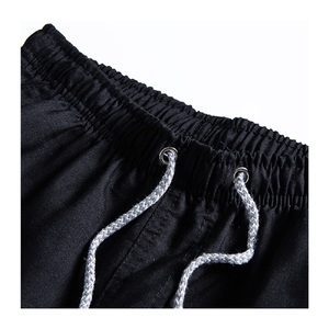 กางเกงขาสั้นชายผ้าสแปนเด็กซ์/คอตตอน แห้งเร็ว เป็นมิตรกับสิ่งแวดล้อม เอวยางยืด เหมาะสำหรับวิ่งชายหาด ว่ายน้ำ โลโก้ด้านหน้าสั่งทำได้ สไตล์ไฮสตรีท ขายส่ง - Product Image 3