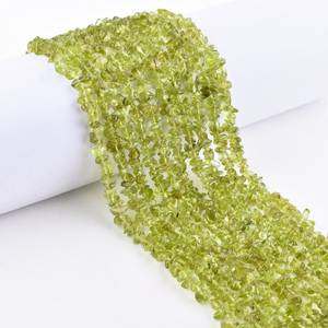 Cuentas de pepita de peridoto verde natural sin cortar Cuentas de peridoto de 4-5mm para hacer joyas Cuentas de piedras preciosas sueltas a precio mayorista - Product Image 2