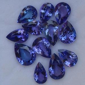 Piedra preciosa suelta de 6x8mm con corte facetado en forma de pera de tanzanita azul natural de la India Kiran & Sons Gems Co para joyería - Product Image 1