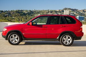 รถยนต์มือสอง BMW X5 3.0i ปี 2005 สีแดงอิโมลา ไม่มีราคาขั้นต่ำ เกียร์ธรรมดา 6 สปีด ระบบขับเคลื่อนสี่ล้อ พร้อมแพ็คเกจพรีเมียม - Product Image 2