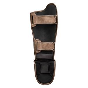 Protections de tibia professionnelles avec rembourrage en mousse haute densité, sangles ajustables à crochets et boucles, et support ergonomique pour les jambes - Product Image 6